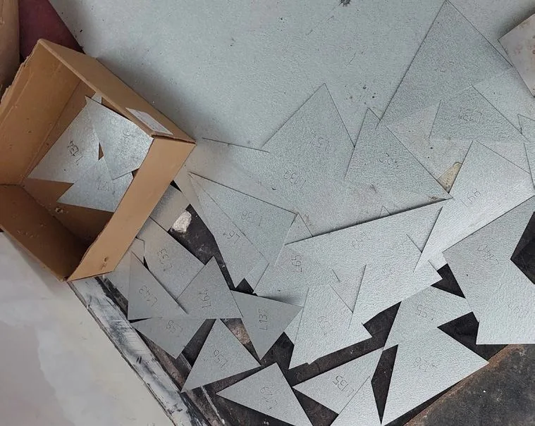 Cut metal panels sorted on the workshop floor